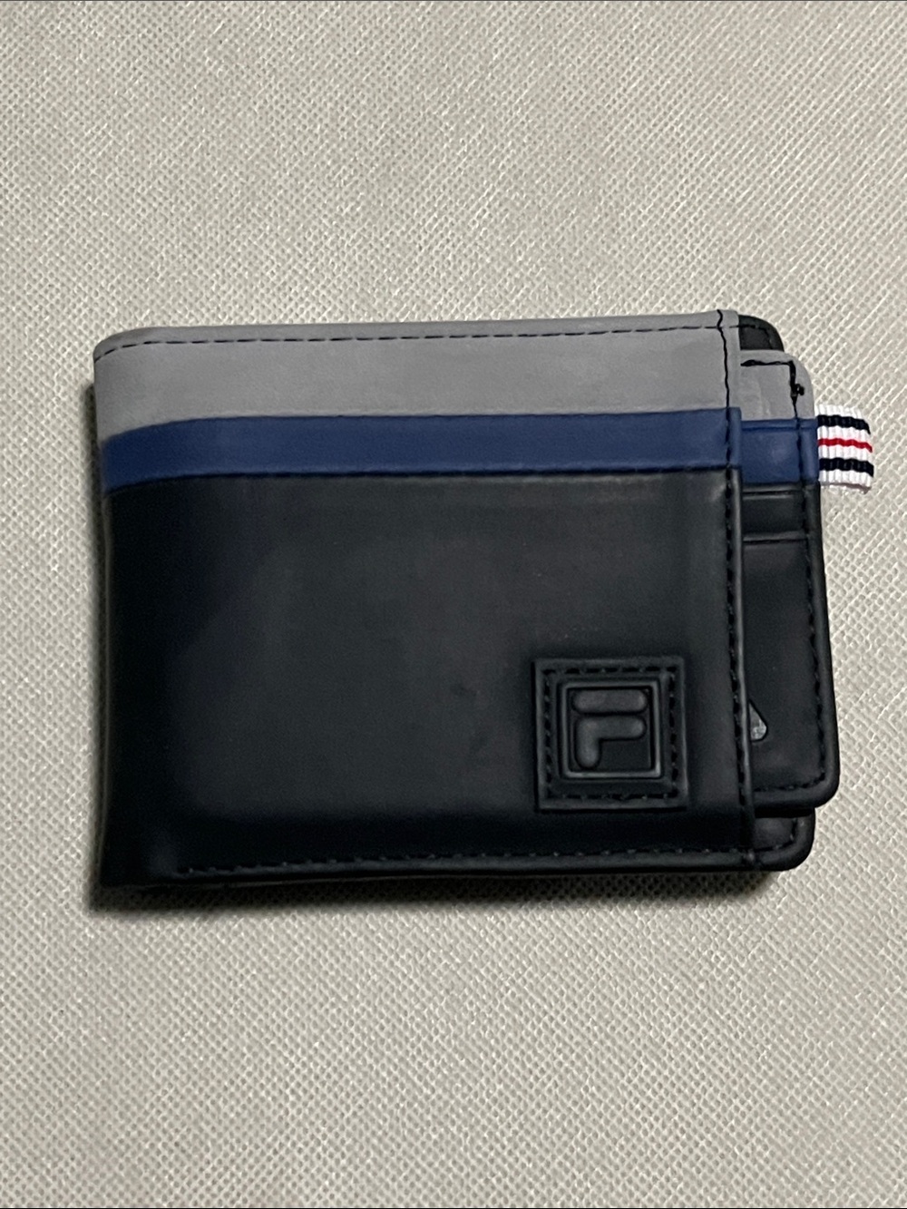 FILA Men's Colorblock Bifold Wallet with a Removable Passcase/Card Holder.